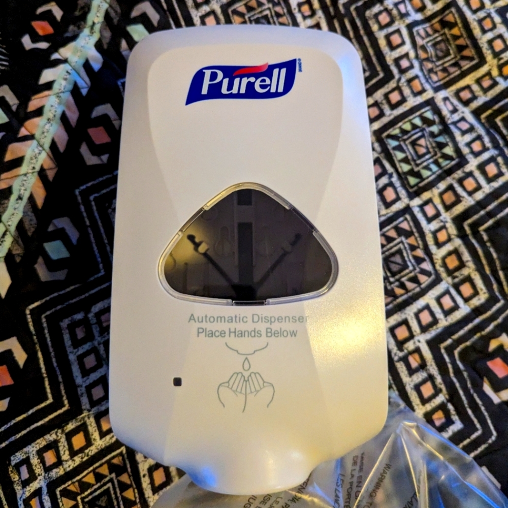 Brand New never used. PURELL TFX Touch-Free Foam Hand Sanitizer Dispenser, Dove